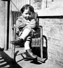 Photo: Herbert sitting on balcony